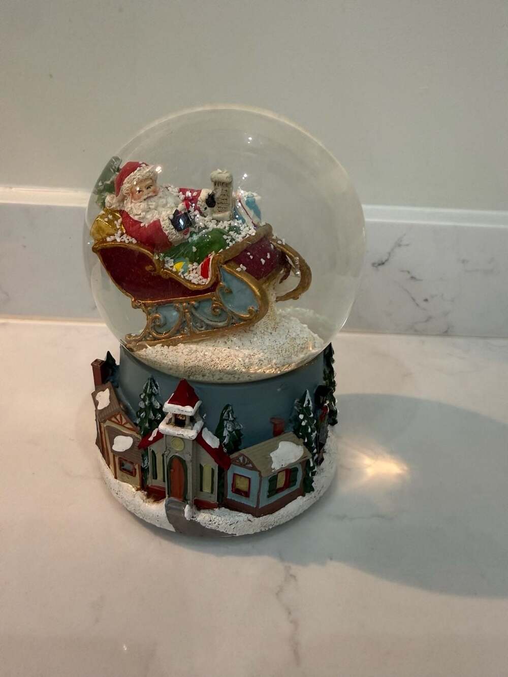 Roman Santa in Sleigh Musical Glitter Snow Globe with Winter Village Base